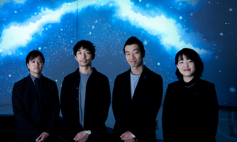 The four creators and designers standing in front of the FLUX installation. Yoshida, we+ (Hokuto Ando and Toshiya Hayashi), Koriyama.