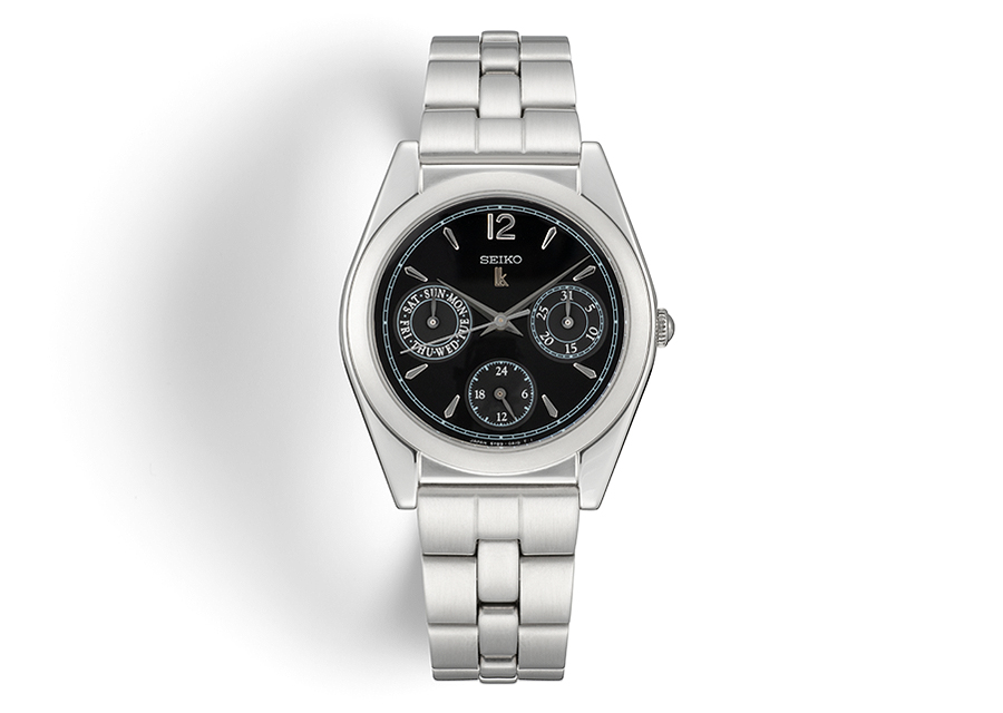 Front view of the first Lukia model (SSVB001) with a round black dial