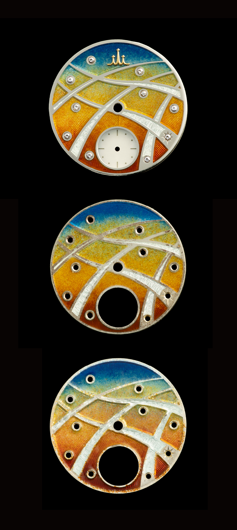 Photo of three enamel dials made as samples