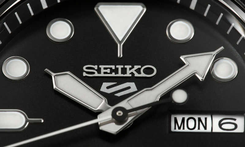 Enlarged photo of the new Seiko 5 Sport logo engraved on the dial