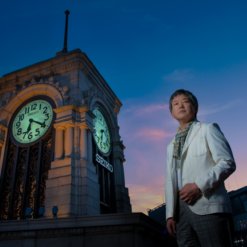Photo of Kazutoshi Itsubo and the Clock Tower of Wako in Ginza