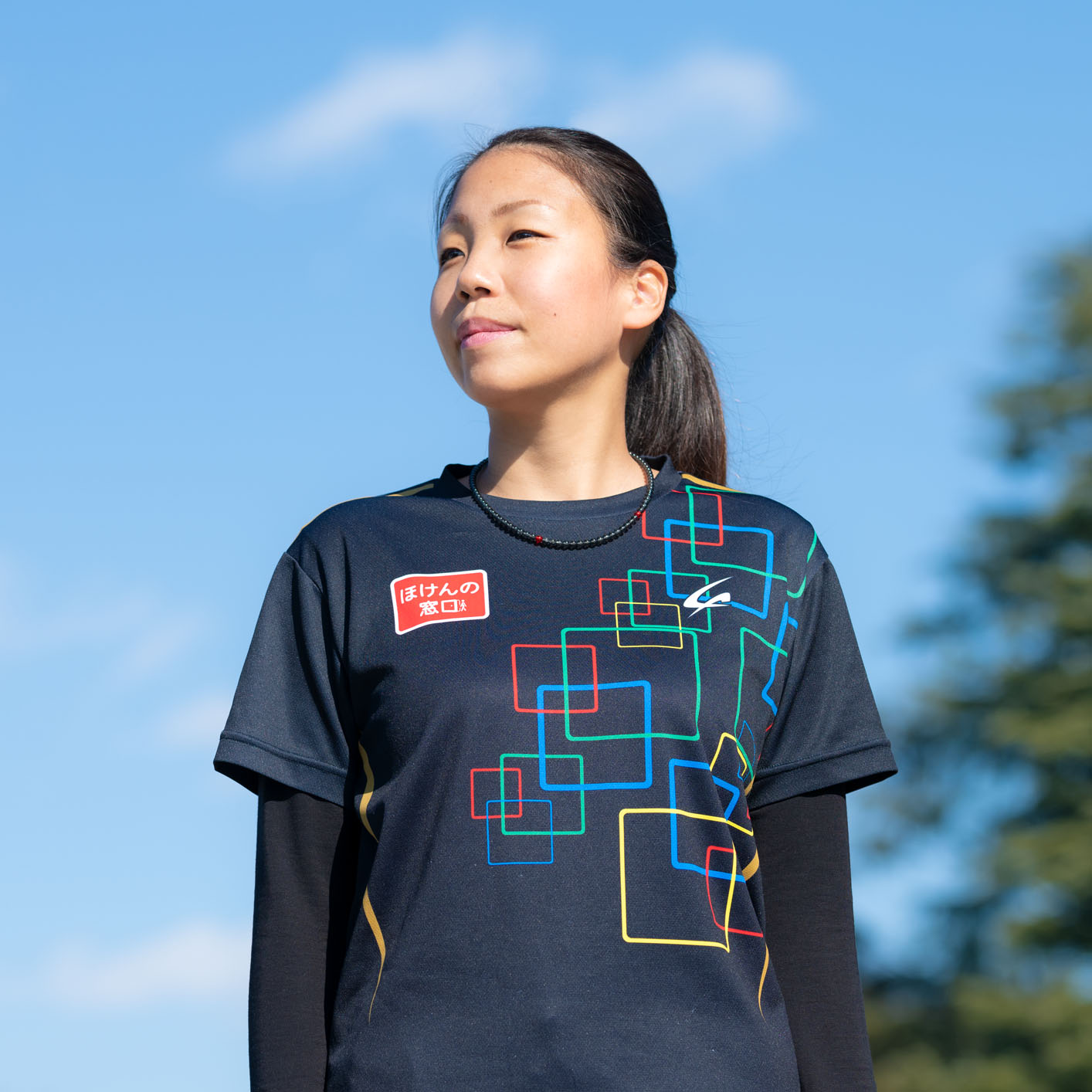 Photo of Ms. Takada in sportswear